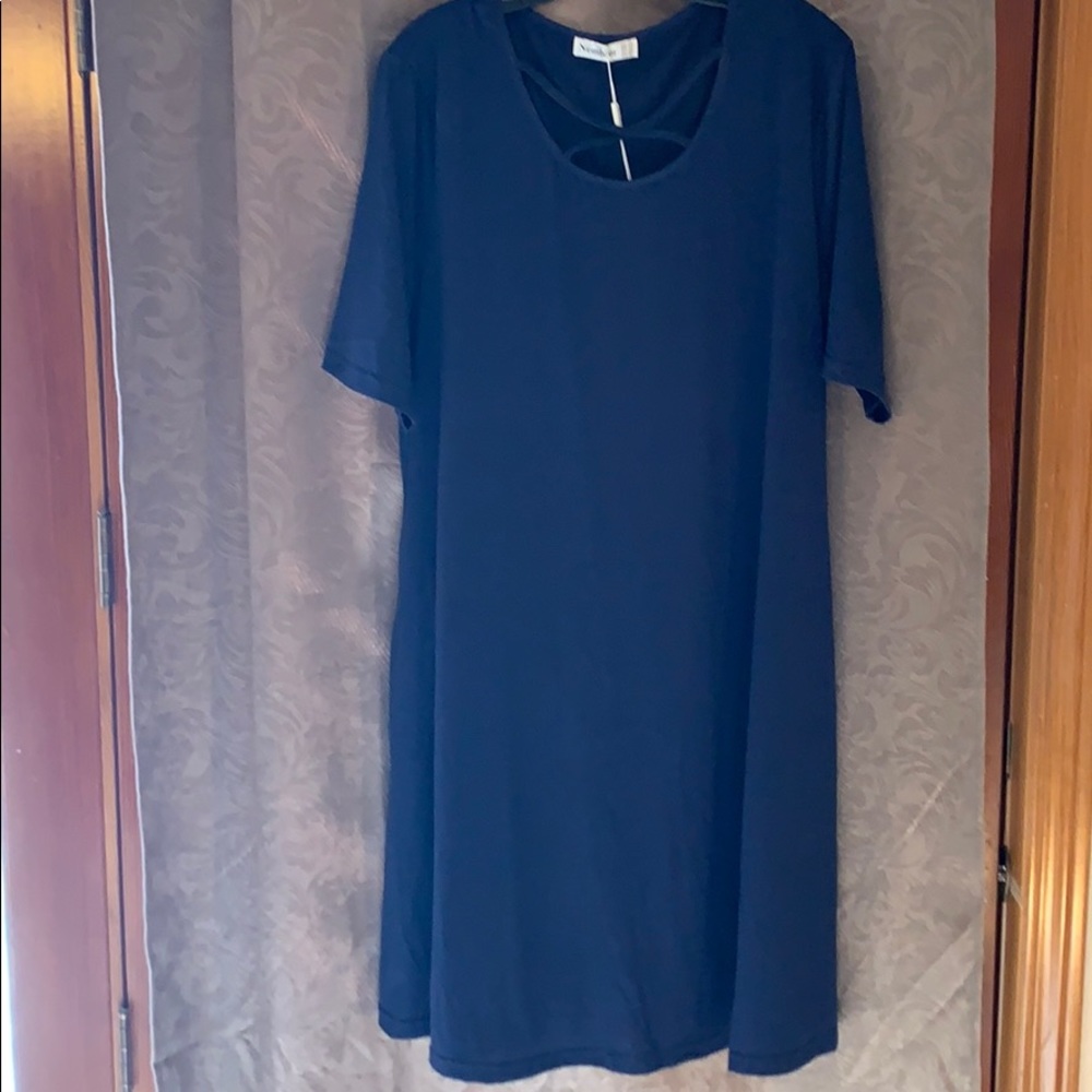 Navy blue dress, shirt sleeved with pockets.